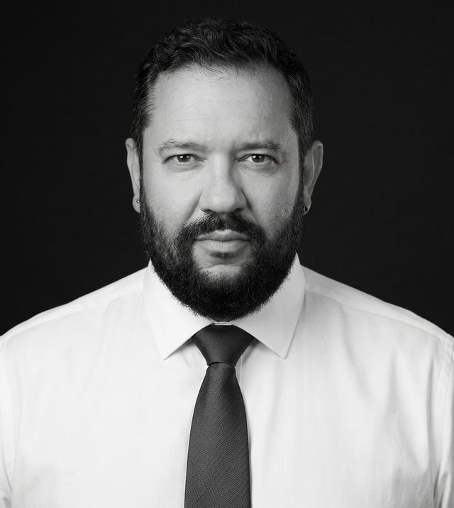 Black-and-white portrait of Marcin Białczyk